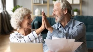 Illinois Gold IRA Investing Company a happy senior couple 300x169